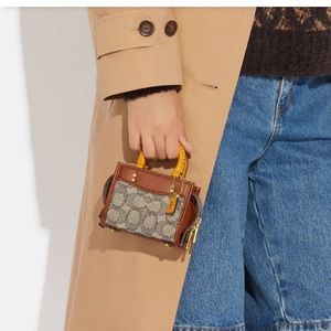 Coach Rogue 12 In Signature Textile Jacquard